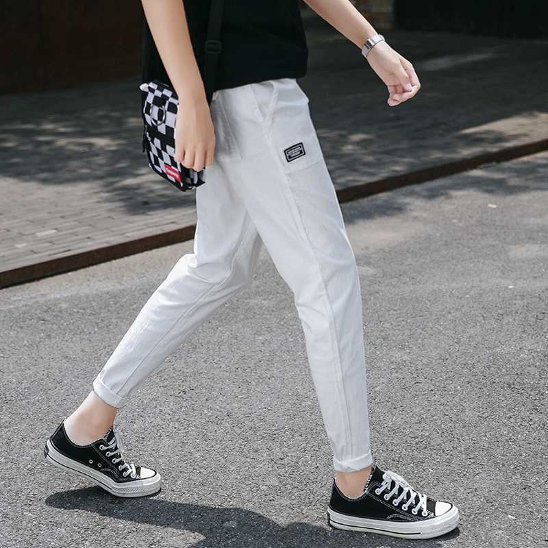 Fall 2019 Men's Fashion Black Casual Pants Men's Slim, Small Feet, Multi-pocket Long Pants