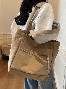 日韩系简约帆布包女文艺范休闲布包大容量通勤百搭大学生单肩包