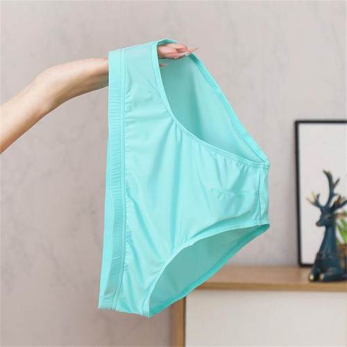 夏季高档冰丝内裤男士三角裤男生新款透气性感透明大号红色短裤头