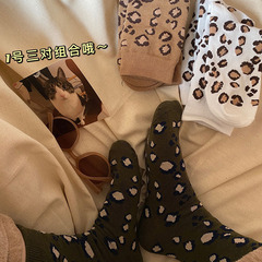 Three pairs of leopard winter stockings