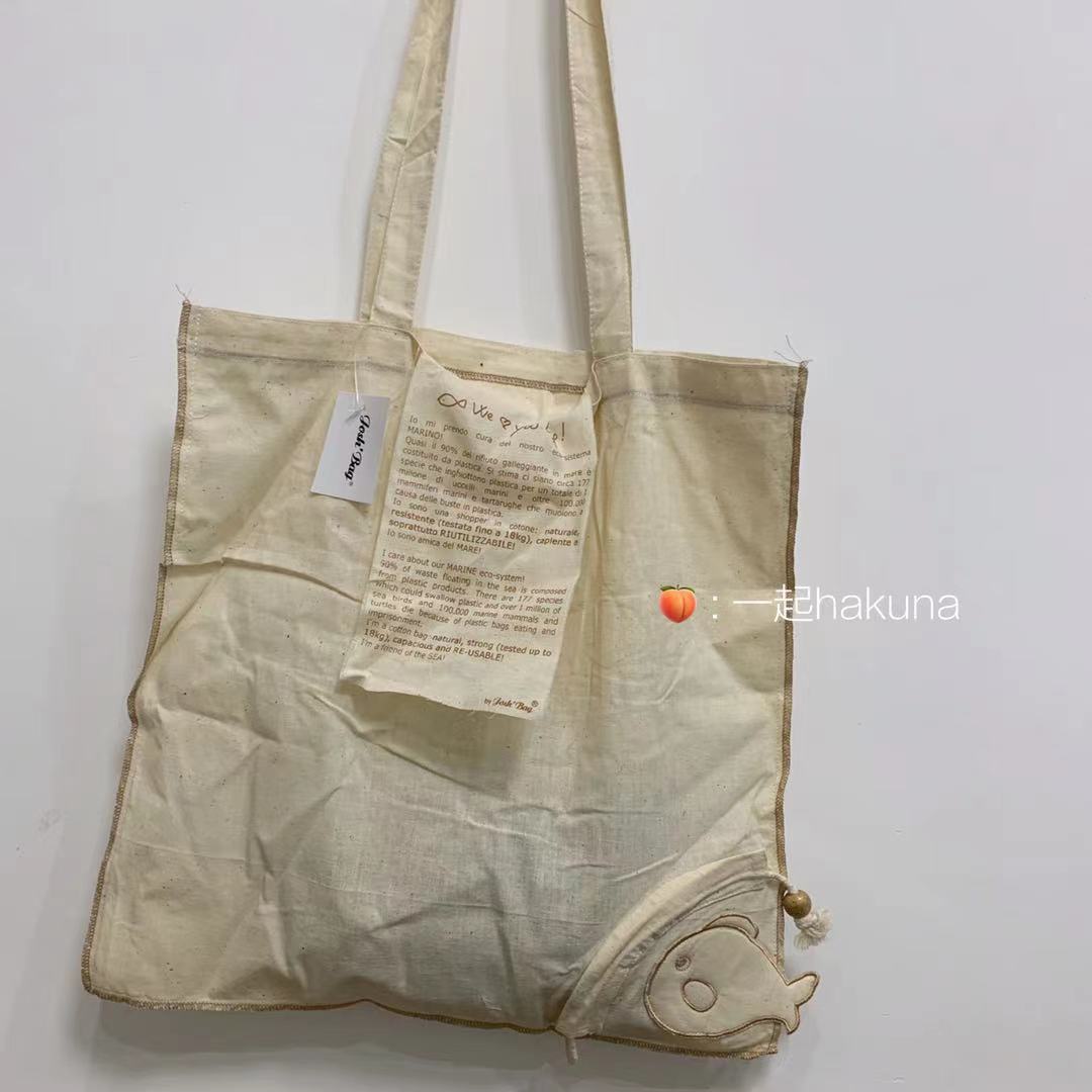 做工复杂木珠装饰 可以收起来扎成 小鱼的 薄款棉布袋