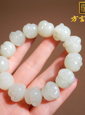 新疆且末料羊脂白玉精雕佛头手串