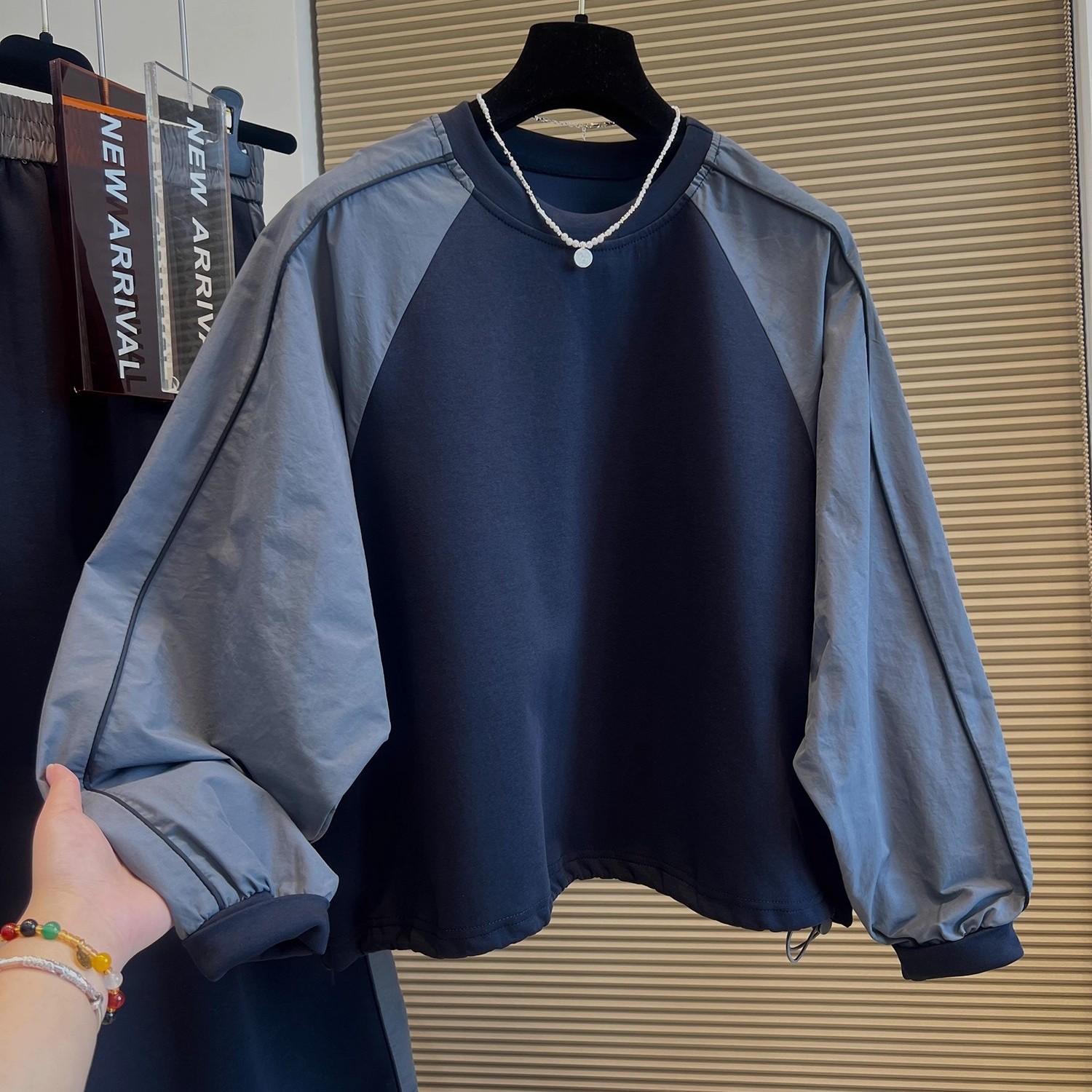 设计感小众撞色拼接时尚套装女2025早秋新款宽松卫衣松紧腰半身裙