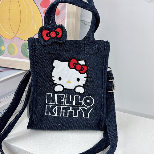 凯蒂猫HelloKitty联名牛仔斜挎手提手机包