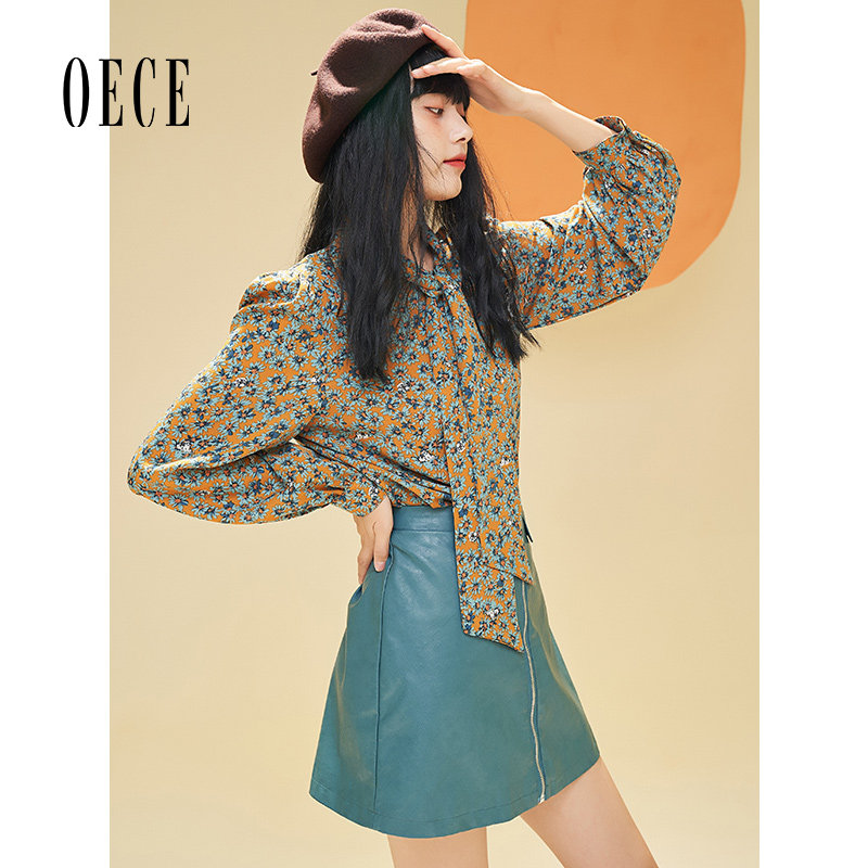 Oece秋装新款女装女孩复古吸睛修身高腰显白皮短裙半身裙