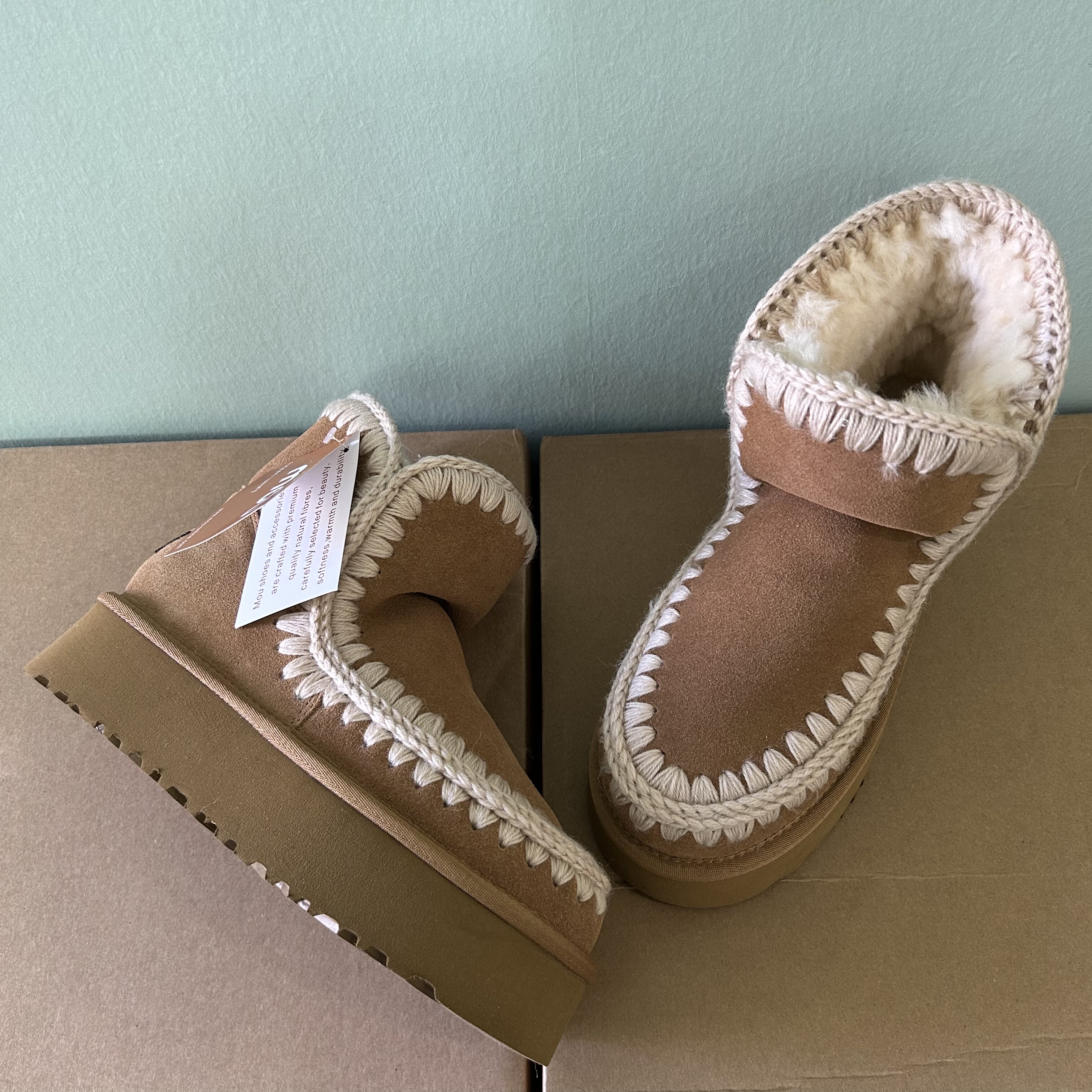 MOU雪地靴2025新款短靴女士雪地靴羊皮毛一体毛线4.5厘米厚底,女鞋,时尚雪地靴,淘宝优惠券,粉丝福利购,淘宝优惠卷