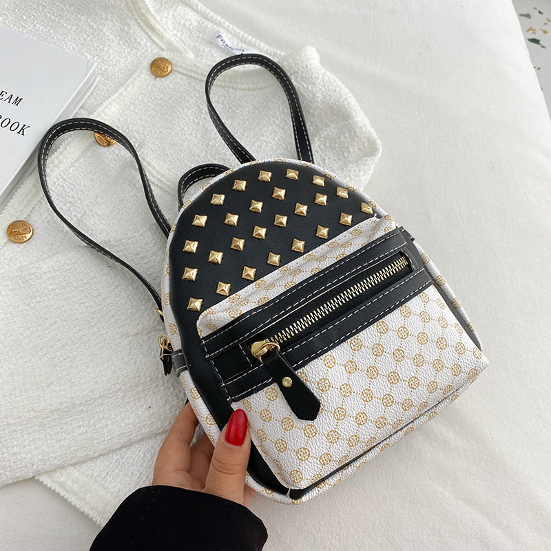 外贸女包2022秋冬韩版印花圆点撞色铆钉双肩背包大容量简约手机包