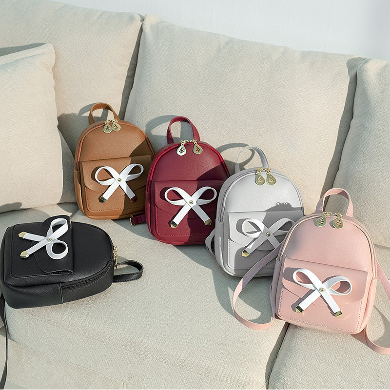 包包2022日韩蝴蝶结女包休闲背包小书包手提单肩斜挎手机包小包包