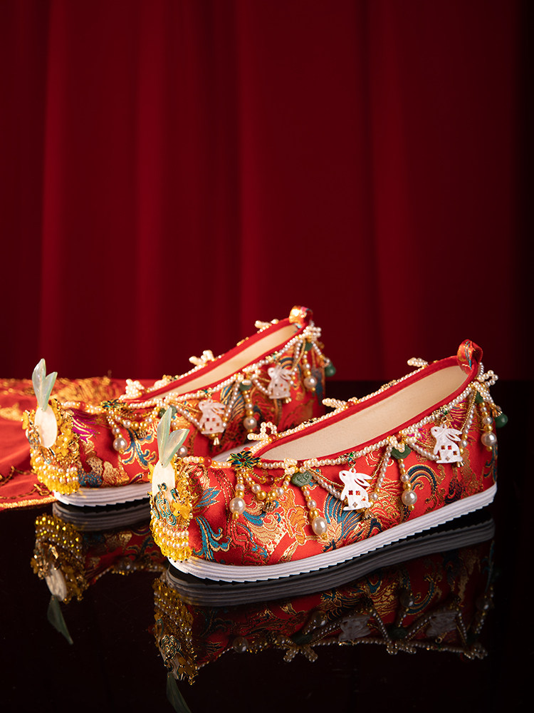 XIUHE WEDDING SHOES WOMENS ORIGINAL YEAR OF THE RABBIT LIMITED WEAVING GOLD INNER TASSEL LIGHT LUXURY CHINESE WEDDING PEARL WEDDING HANFU SHOES