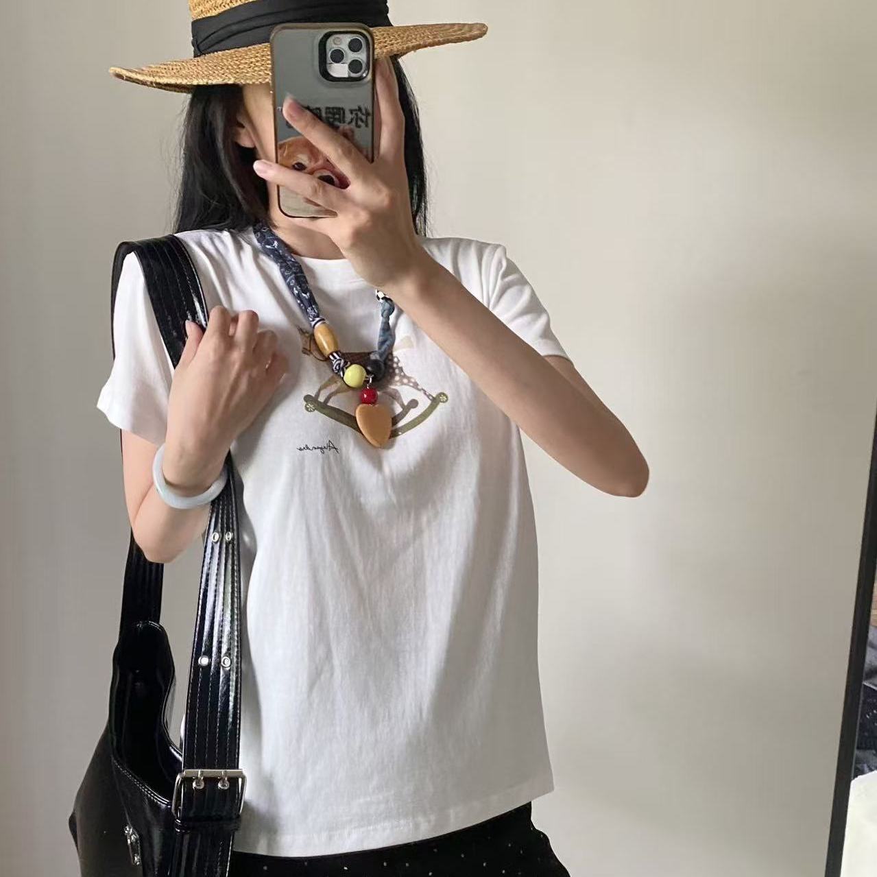 NUOGU2025早秋木马印花时尚圆领挂件卡通图百搭短袖T恤衫上衣女