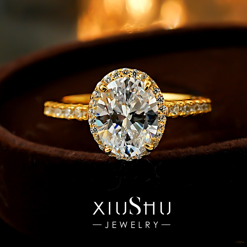 《 星芒鸽子蛋》火彩2克拉椭圆钻戒款925银镀黄金色婚戒女友礼物