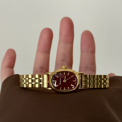 中古风红盘金色钢带石英女表