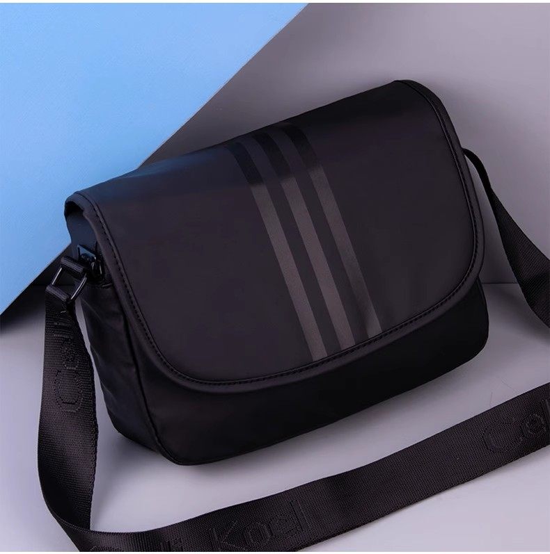 斜挎包男大容量2025新款青少年牛津布单肩包潮帆布小众轻便高级感