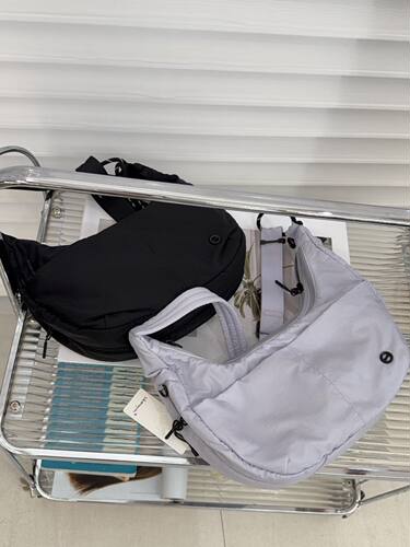斜挎包男女通用2026新款轻便尼龙休闲防水通勤包女单肩大容量包