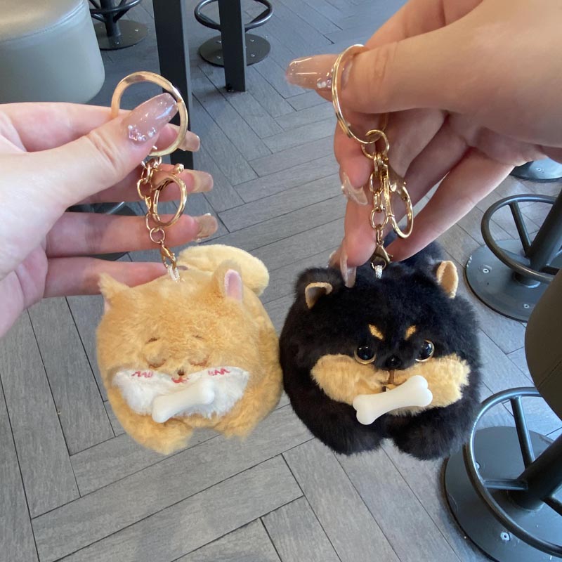 啃骨头摇尾巴小狗玩具