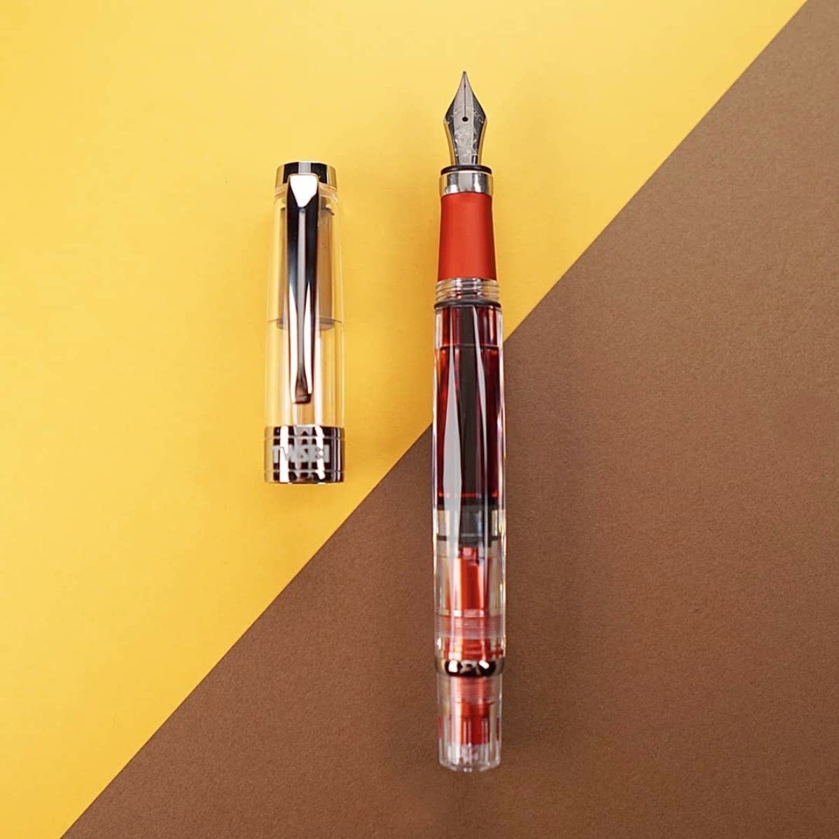 台湾twsbi 三文堂 diamond 钻石580al 喜金红铝合金透明活塞钢笔