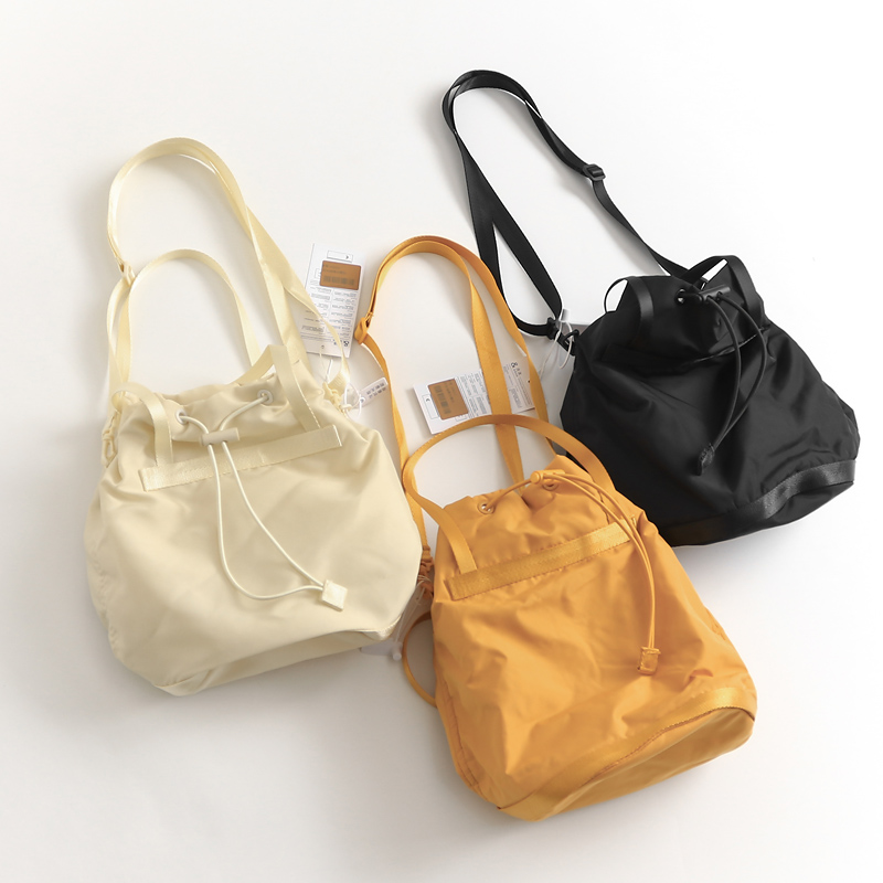 单肩包手拎包大容量水桶包