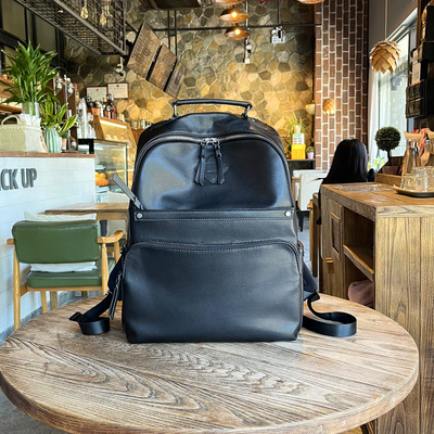 狼道头层牛皮商务大容量双肩包