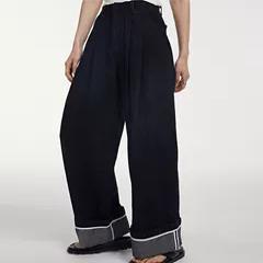 【UNRESTRAIN】UNR设计师品牌黑/白色翻边裤脚休闲牛仔裤女