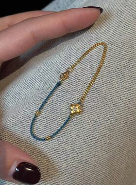 黄金色四叶小花编织手链女小众精致新中式国风百搭半链半绳手饰