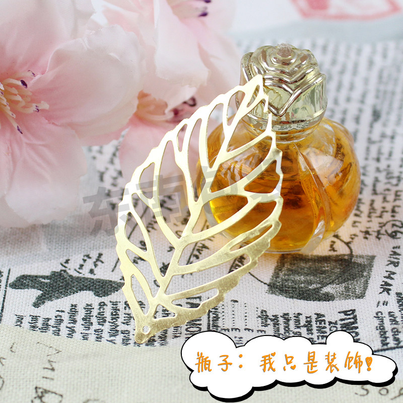 金色镂空树叶饰品喜糖盒图片