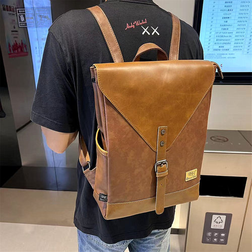 潮牌PU皮男士双肩包学生书包