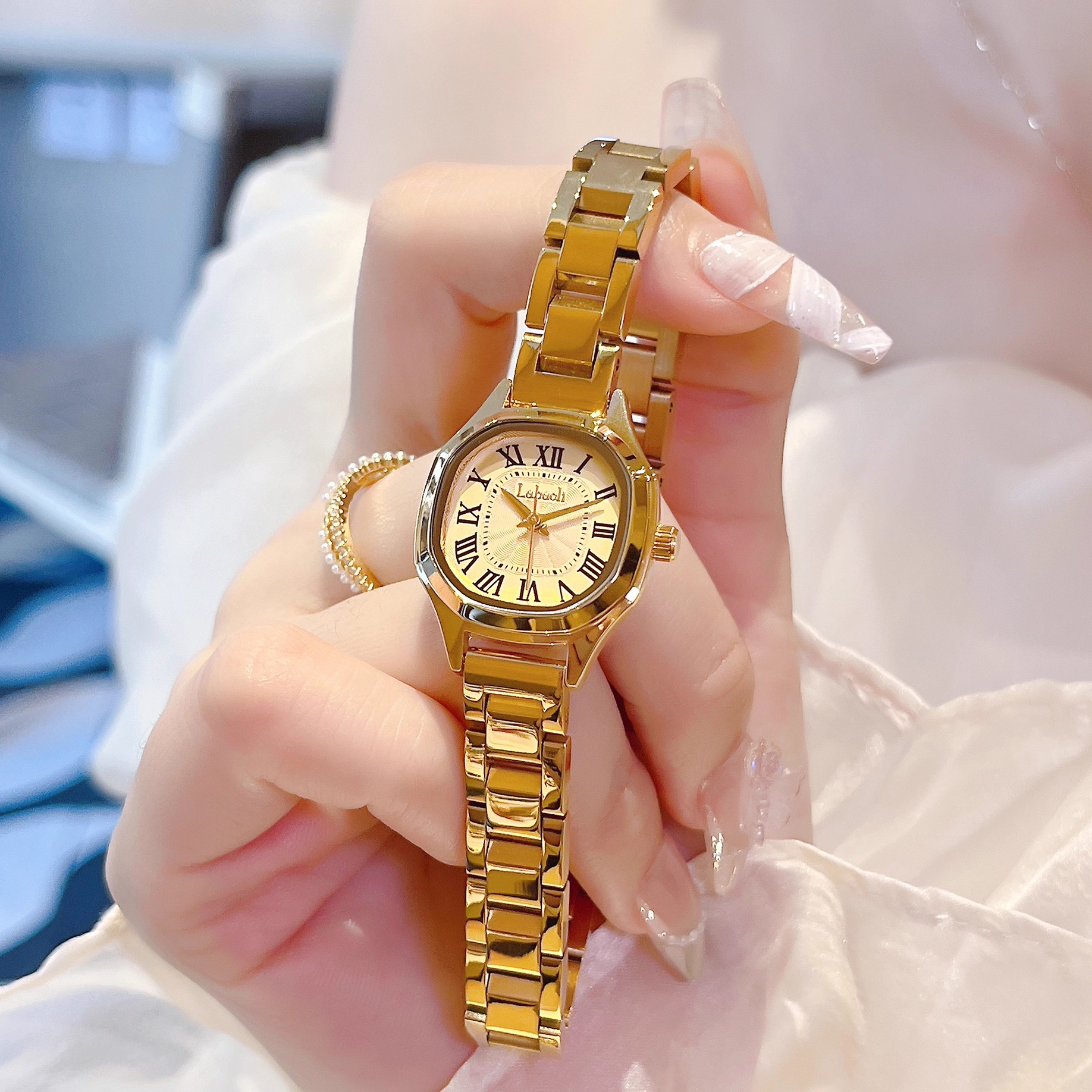 拉宝丽正品女表时尚钢带小金条