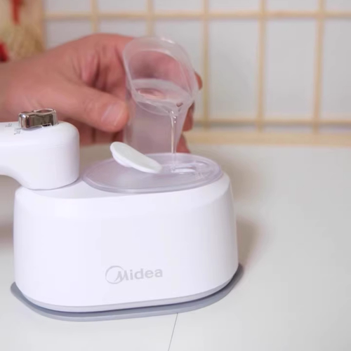 美的熨烫机家用小型蒸汽手持挂烫机便携式出差旅游用电熨斗YS10T1