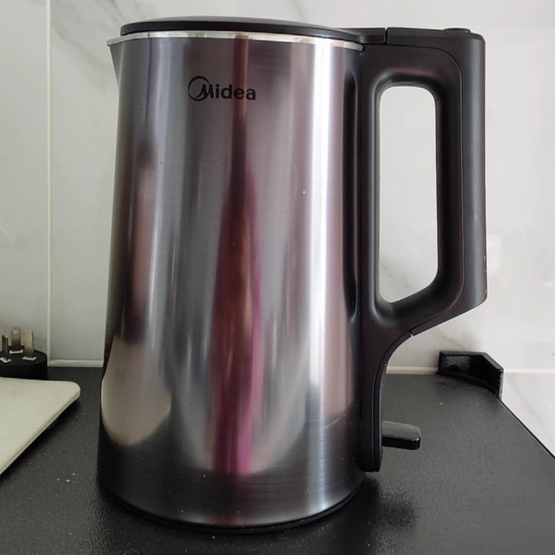 Midea/美的 SH17X2-301电热水壶304不锈钢无缝内胆双层防烫1.7L壶