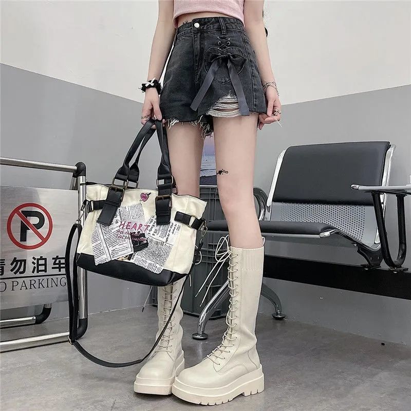 蝴蝶结绑带破洞牛仔短裤女夏季新款韩版高腰宽松显瘦显高阔腿热裤