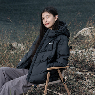 耐克女款羽绒服2025春季新款黑色连帽保暖防寒运动休闲外套HV5236