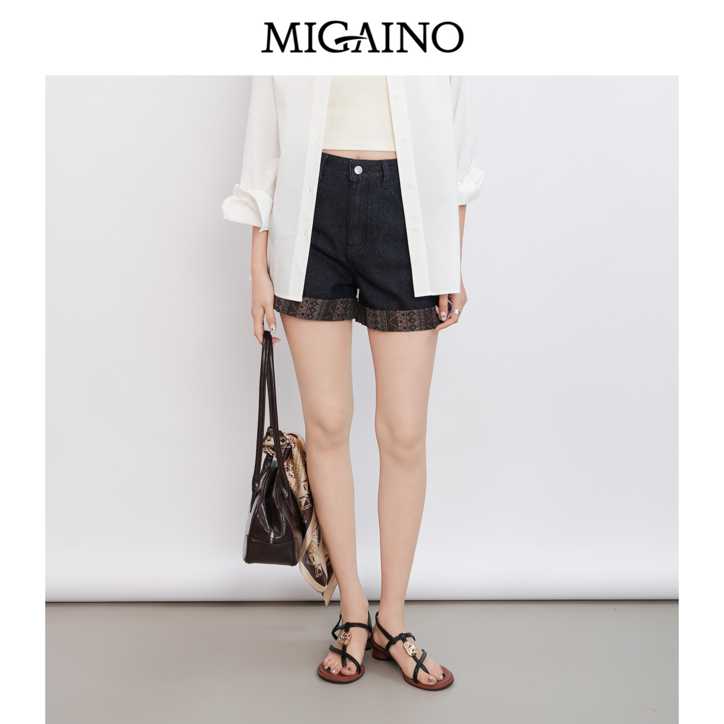 Migaino曼娅奴女装2026年夏季新款时尚卷边印花牛仔短裤MQ22NA024