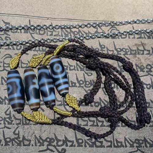 黑白渗透蓝沁台湾工艺天珠宝瓶二三眼双虎牙图案助梦金翅编绳手链