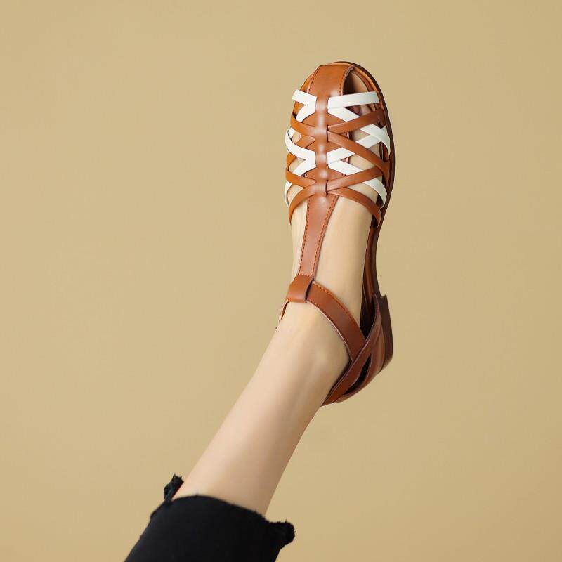 百搭休闲拼色镂空洞洞鞋2025夏季新款一字扣带平底包头罗马凉鞋女