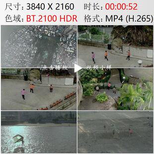 航拍澳门白鸽巢公园大妈晨练沙滩足球黑沙海滩休闲健身视频素材