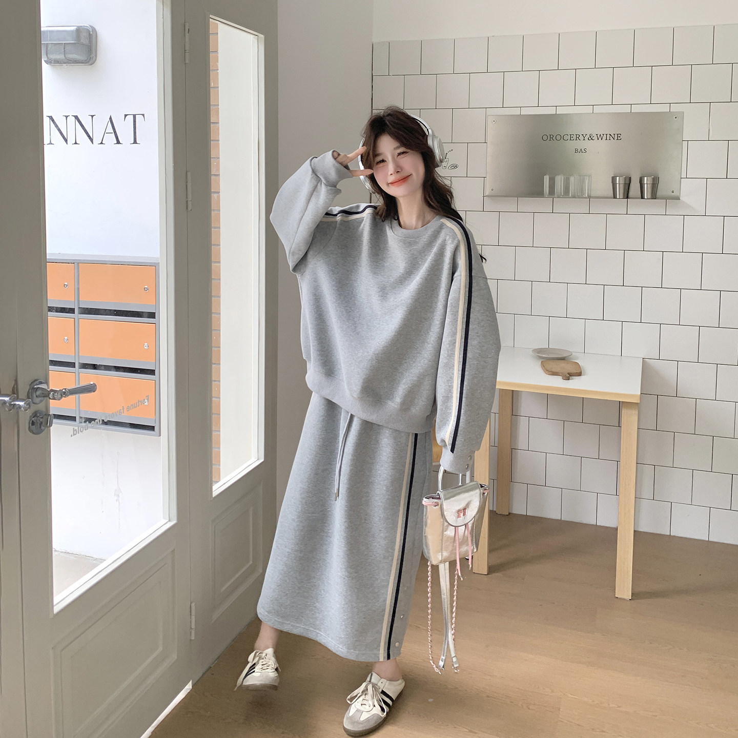 灰色针织卫衣半身裙套装女春季2026新款休闲运动爆款松弛感两件套