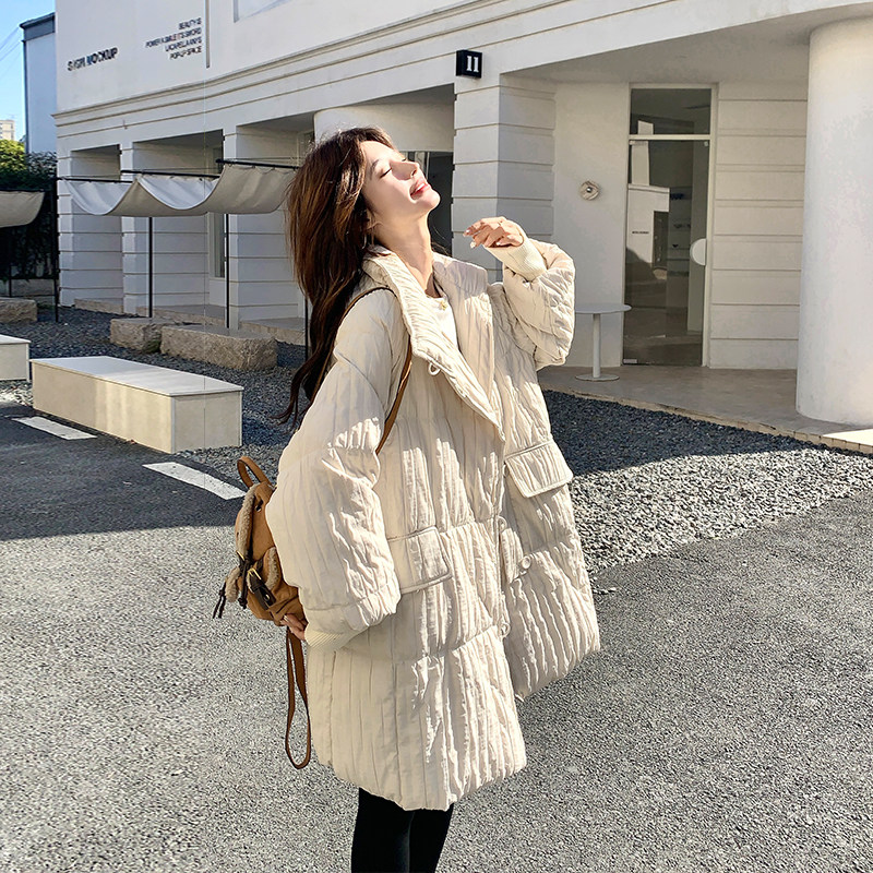 米白色肌理感中长款羽绒服女冬季