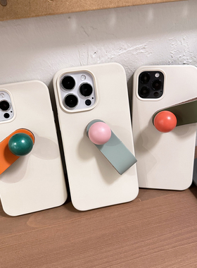 TRstudio第二代原创设计首发糖果色圆球支架真皮手环液态硅胶手机壳适用于iphone15promax131214pro全包可爱