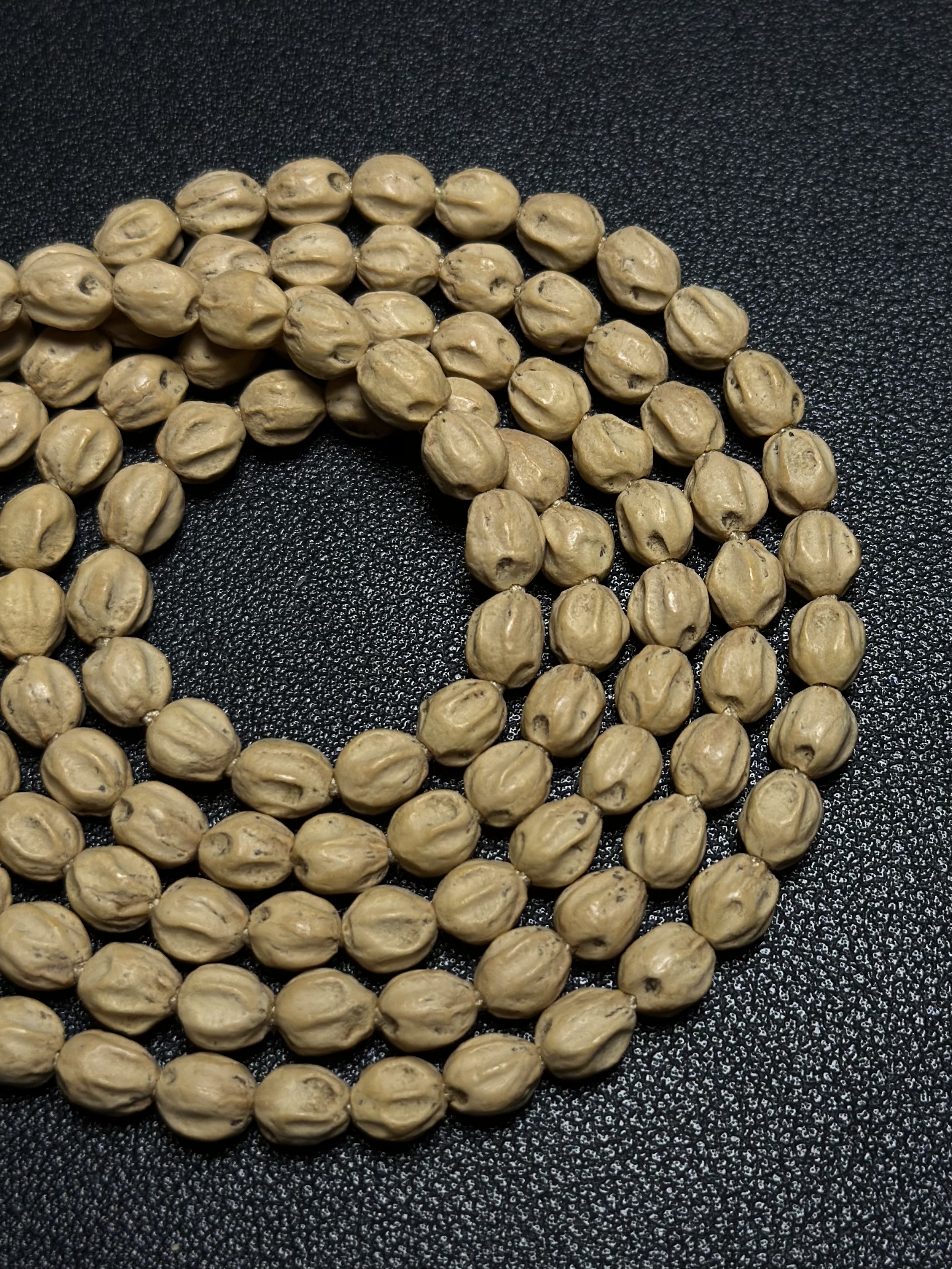 热振柏香籽无修胶囊桩玉化水晶皮顺棱干净深坑N