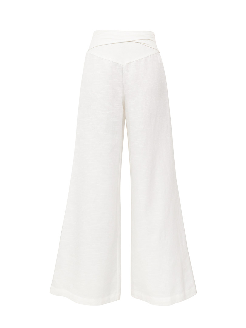 White wide-leg pants with wrap waist detail on white background
