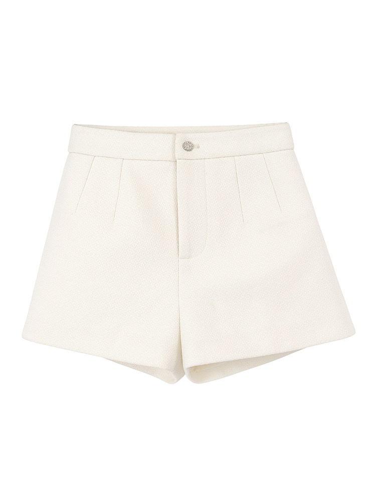 White high-waisted shorts with pleats and button closure on white background