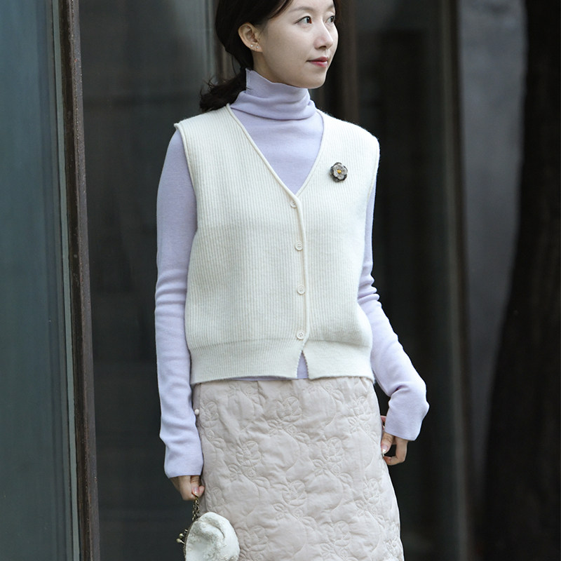 前世今生单排多扣V领针织马夹