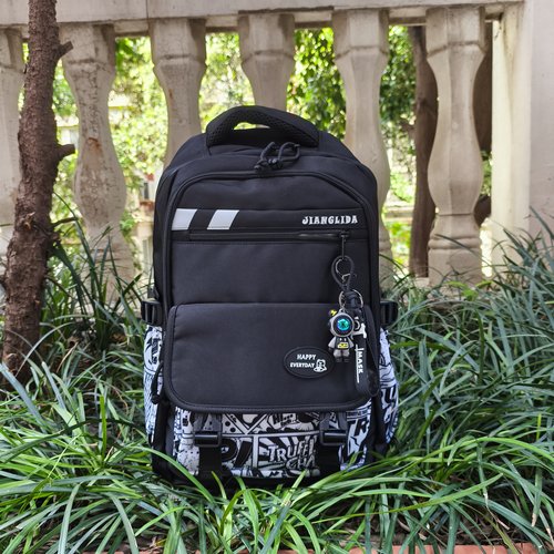 韩版初中生书包男大容量双肩包卡通涂鸦高颜值防水休闲背包