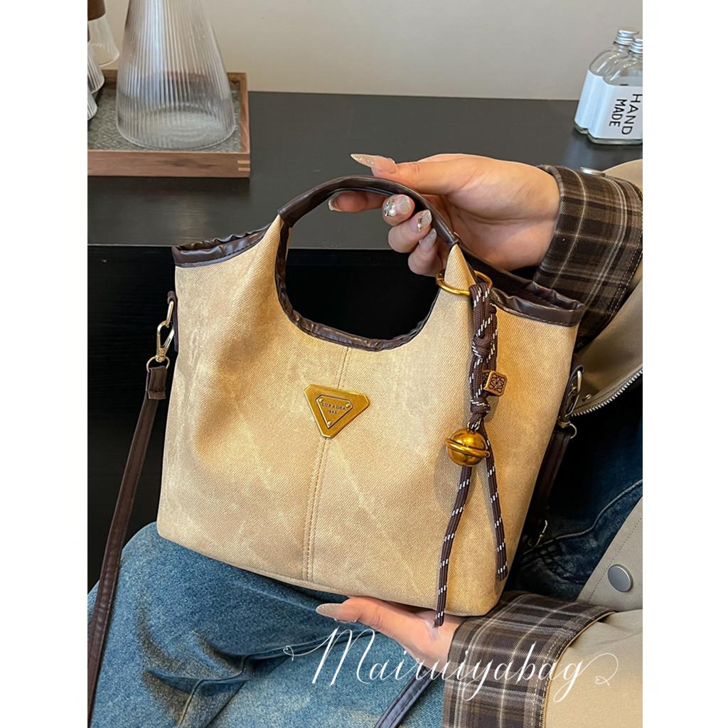 麦瑞雅百搭斜挎时尚手提水桶包