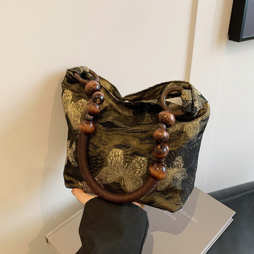 麦瑞雅原创焦糖蝴蝶复古水桶包