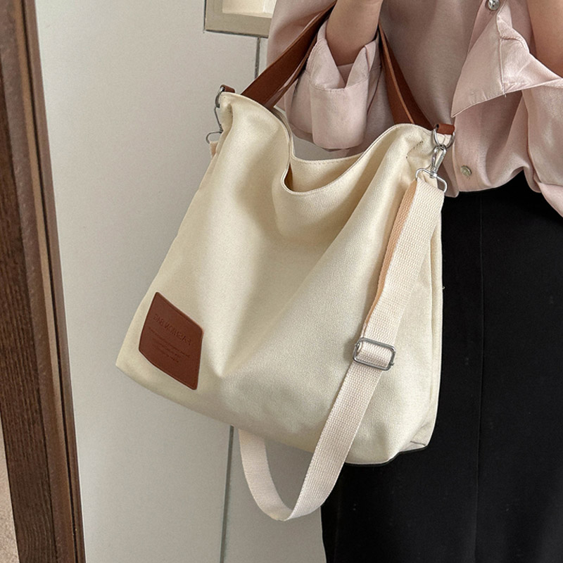 麦瑞雅小众通勤斜挎托特水桶包