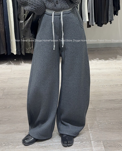 欧洲站2025冬新款加厚时尚松紧腰抽绳宽松显瘦弯刀休闲卫裤女
