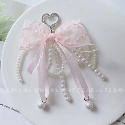 新款韩国ins时尚蝴蝶结珍珠手机挂链包挂件钥匙扣粉色甜美少女感