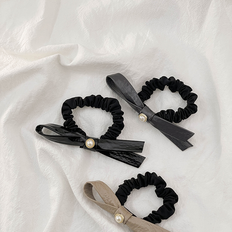 【20元任选2件 送1件】品牌撤柜清仓~气质优雅皮质蝴蝶结小肠发圈