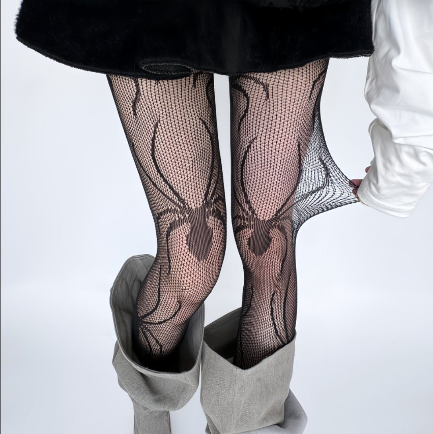 不规则蜘蛛网镂空黑色连裤袜